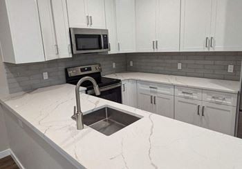 Kitchen with white stone